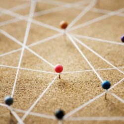 Push pins connected linear network  background
